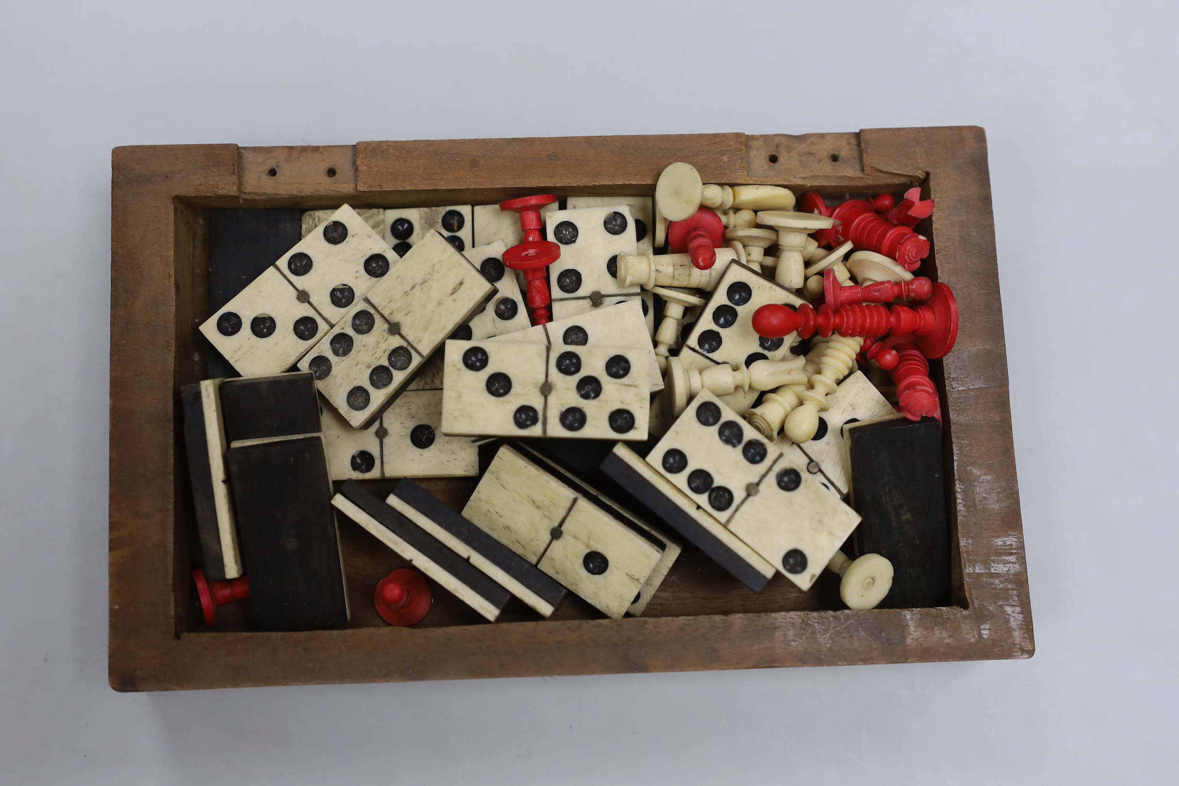 A bone domino and chess set and a cards and box